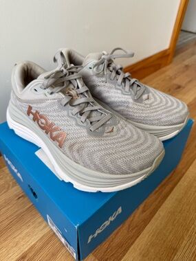 Hoka Women's Light Gray Running Shoes with Rose Gold Logo